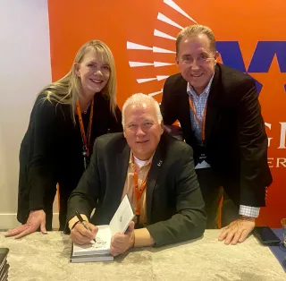 Eric and Laura Hutter with retirement author Tom Hegna
